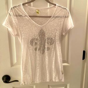 White Fleur-de-lis shirt.